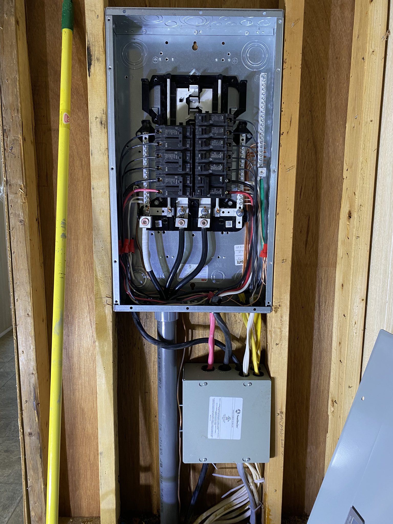 Interior of a home electrical panel during an upgrade.