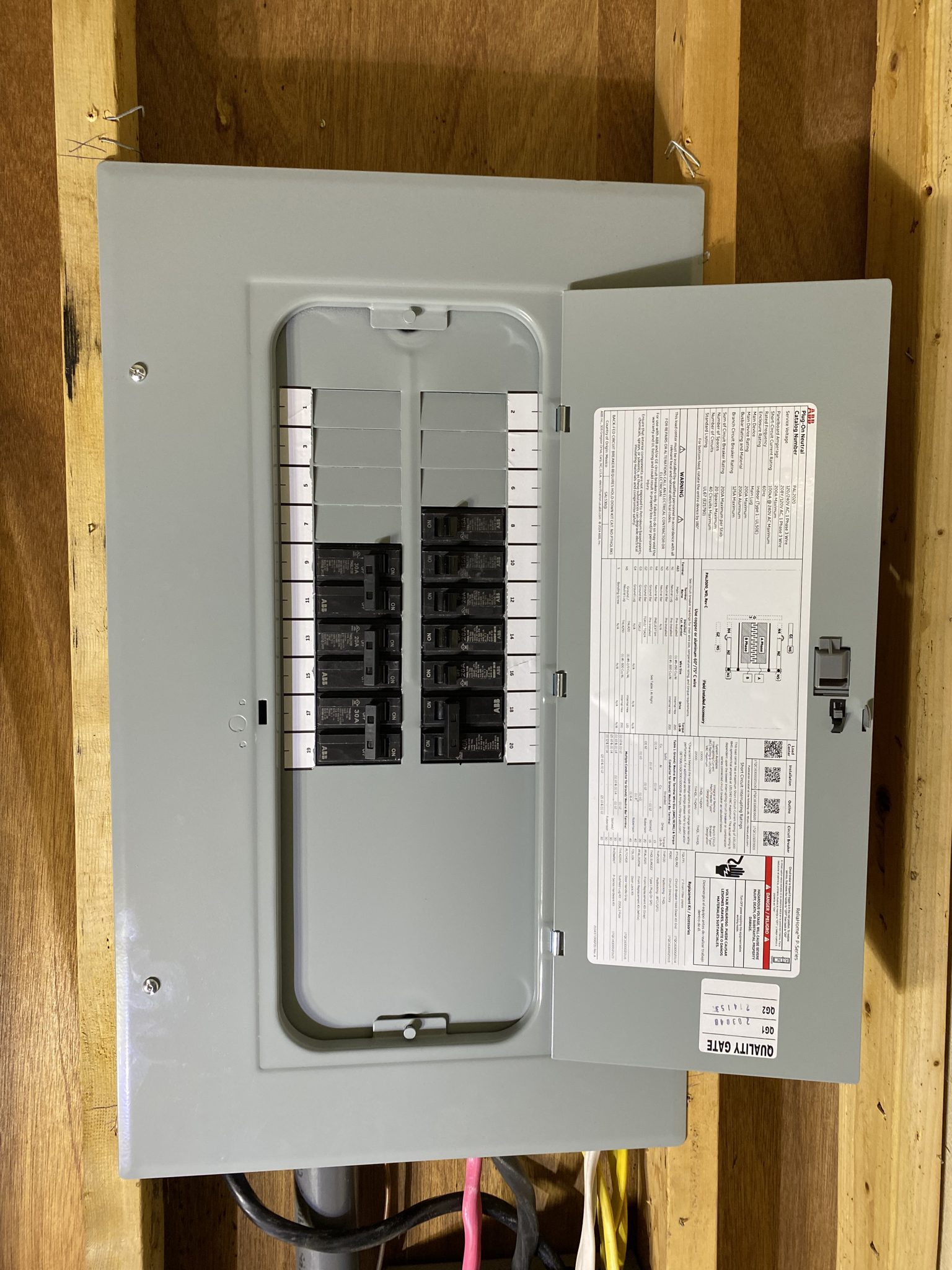 Third view of a home electrical panel during an upgrade.