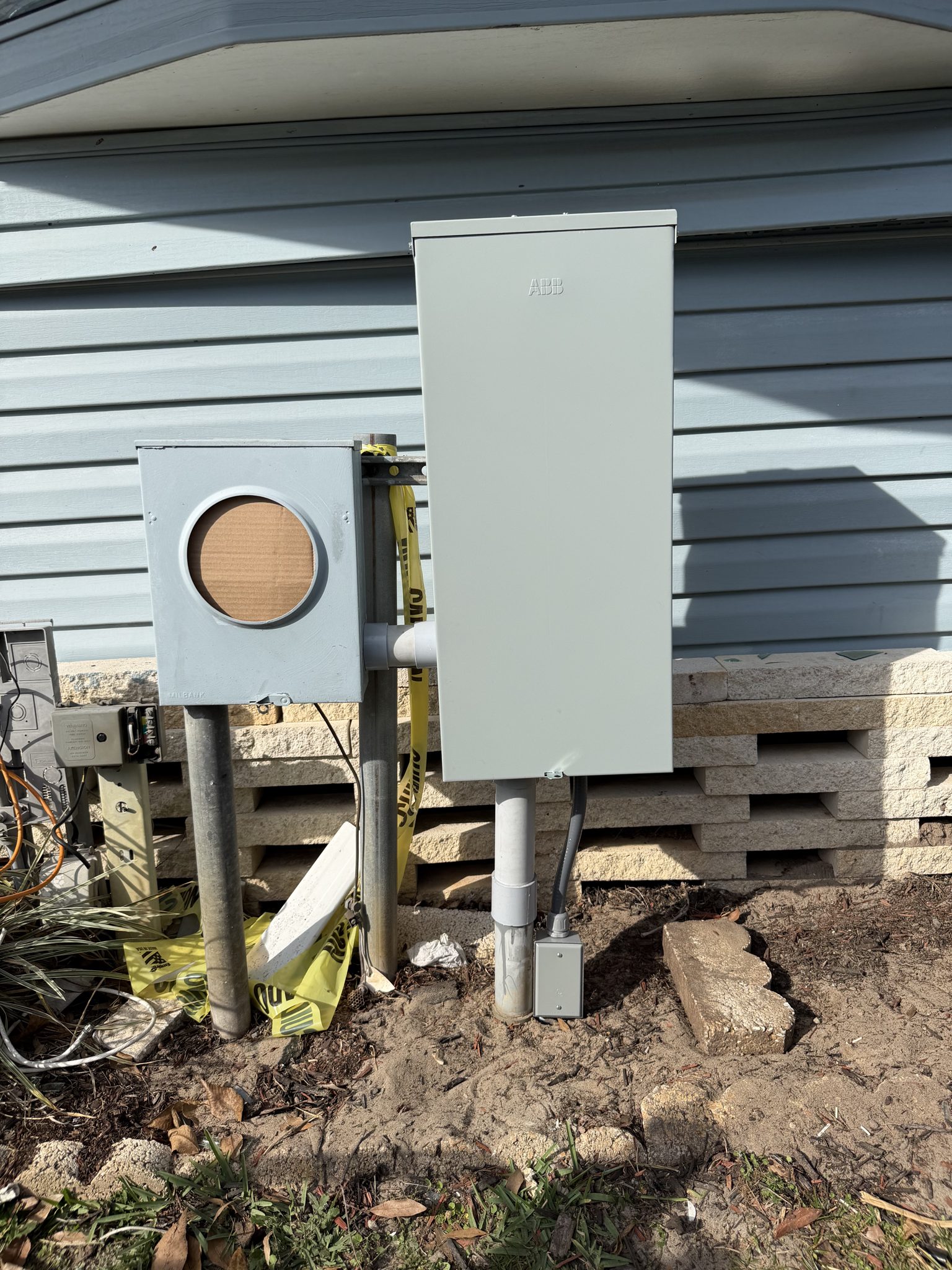 Second view of an installed home electrical panel.