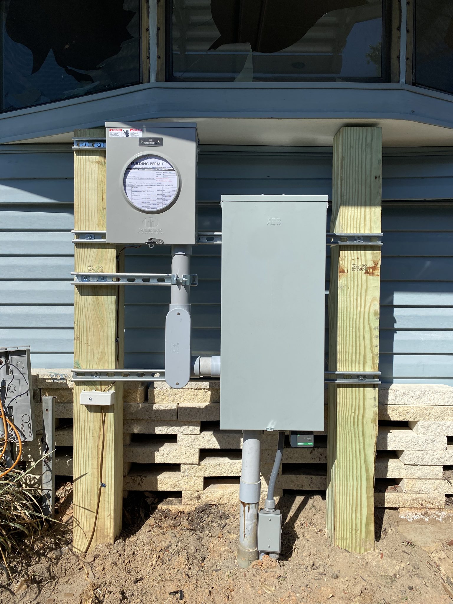 Third view of home electrical panel wiring during an upgrade.