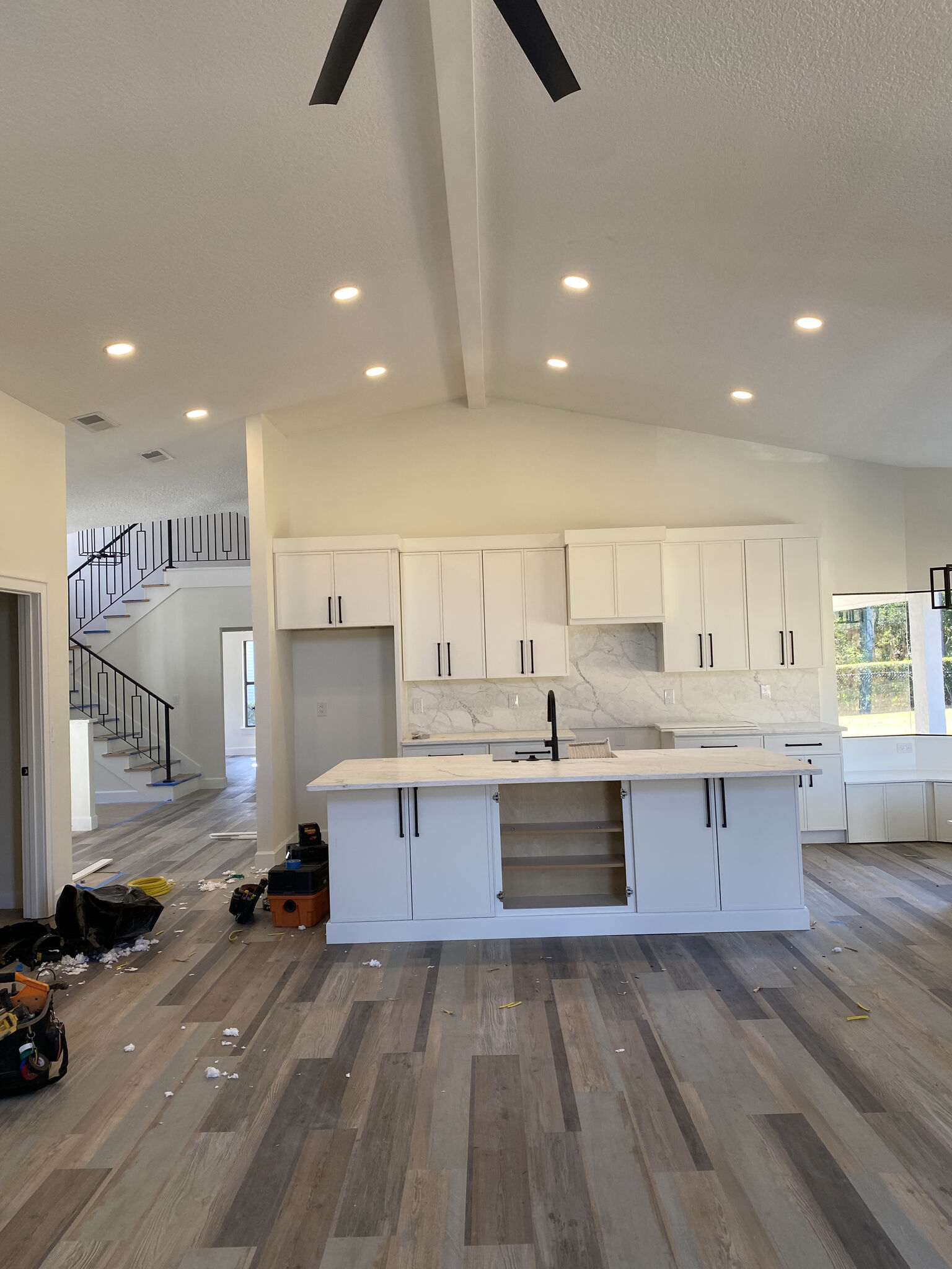 Finished ceiling with recessed downlights providing even light coverage.